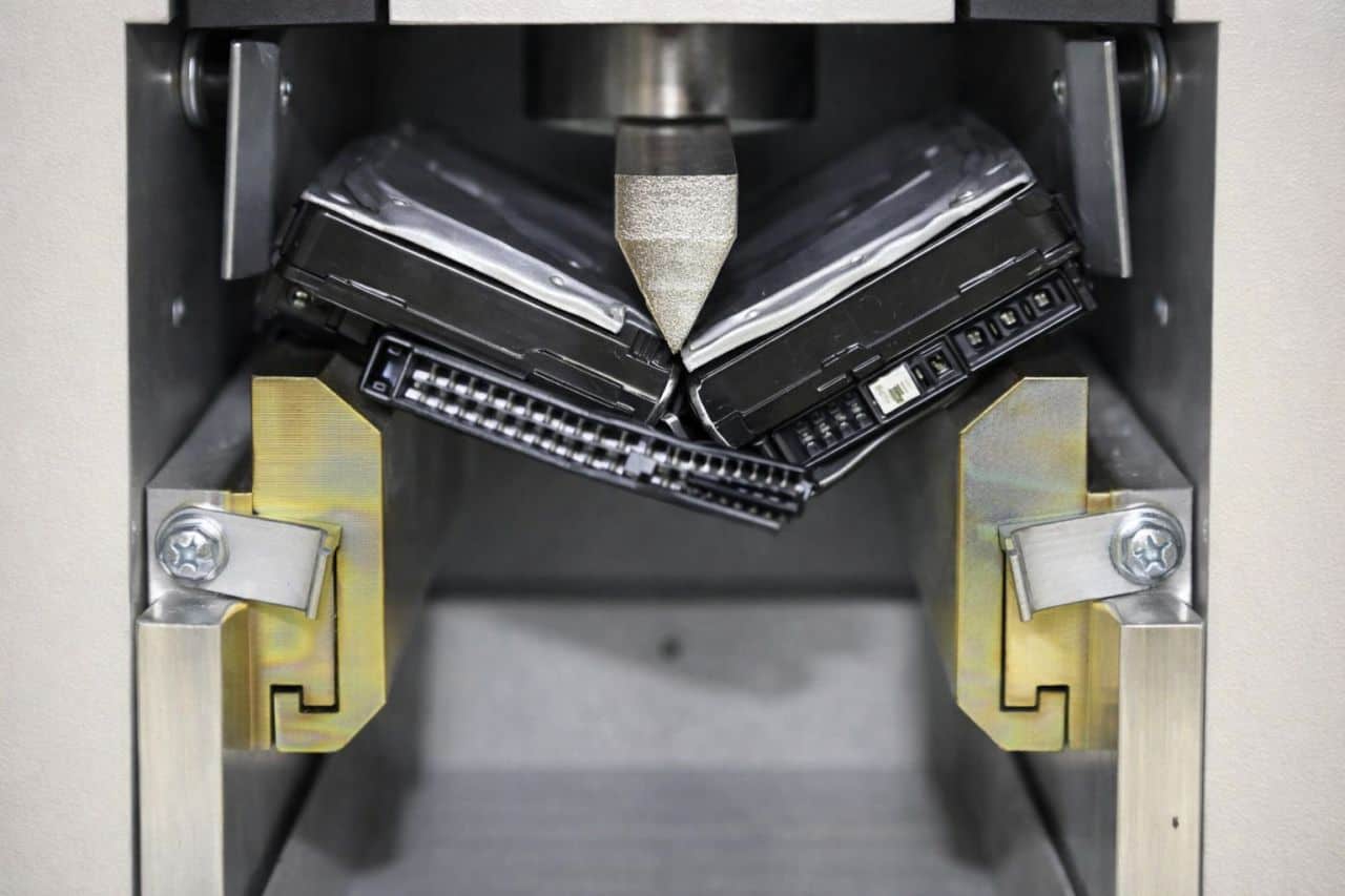 Hard drive destruction Houston: HTL 365 industrial disk crusher for secure data disposal.